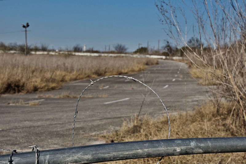 The pieces of asphalt that used to make up the figure-eight configuration can no longer be seen from outside of the race track.
